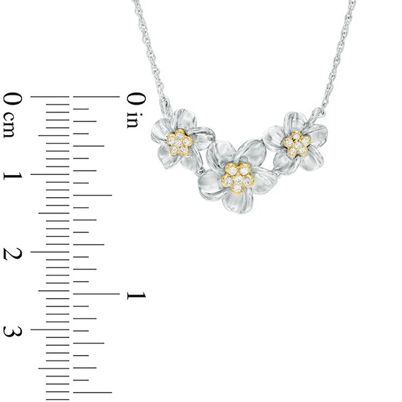 0.15 CT. T.W. Diamond Triple Pinwheel Flower Necklace in Sterling Silver and 10K Gold