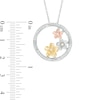 0.18 CT. T.W. Diamond Triple Pinwheel Flower Swirl Circle Pendant in Sterling Silver and 10K Two-Tone Gold