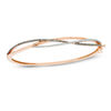 0.50 CT. T.W. Champagne and White Diamond Crossover Bangle in 10K Rose Gold