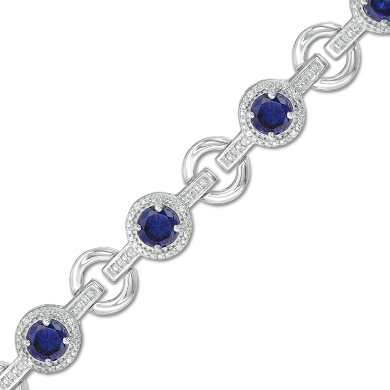 5.0mm Lab-Created Blue Sapphire and 0.09 CT. T.W. Diamond Circle Link Bracelet in Sterling Silver - 7.25"