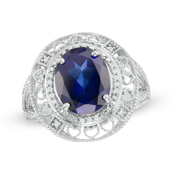 Oval Lab-Created Blue Sapphire and 0.14 CT. T.W. Diamond Hearts Frame Ring in Sterling Silver