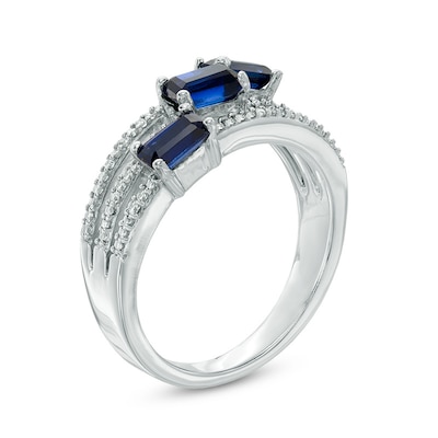 Emerald-Cut Lab-Created Blue Sapphire and 0.11 CT. T.W. Diamond Three Stone Slant Ring in Sterling Silver