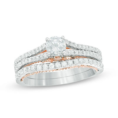 0.95 CT. T.W. Certified Canadian Diamond Split Shank Bridal Set in 14K Two-Tone Gold (I/I2)