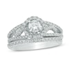 0.70 CT. T.W. Diamond Frame Split Shank Bridal Set in 10K White Gold