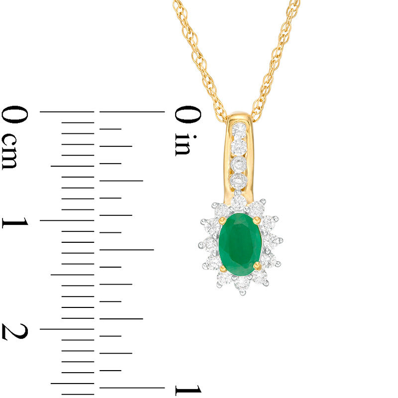 Oval Emerald and 0.25 CT. T.W. Diamond Sunburst Frame Pendant in 10K Gold|Peoples Jewellers