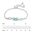 Thumbnail Image 1 of 6.0mm Blue Topaz and Diamond Accent Loop Bypass Bolo Bracelet in Sterling Silver - 9.5"
