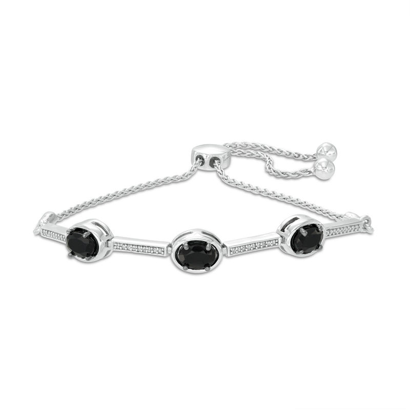 Oval Onyx and 0.09 CT. T.W. Diamond Three Stone Bar Bolo Bracelet in Sterling Silver - 9.5"|Peoples Jewellers