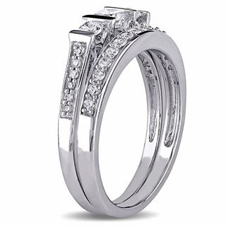 0.73 CT. T.W. Diamond Three Stone Bridal Set in 10K White Gold