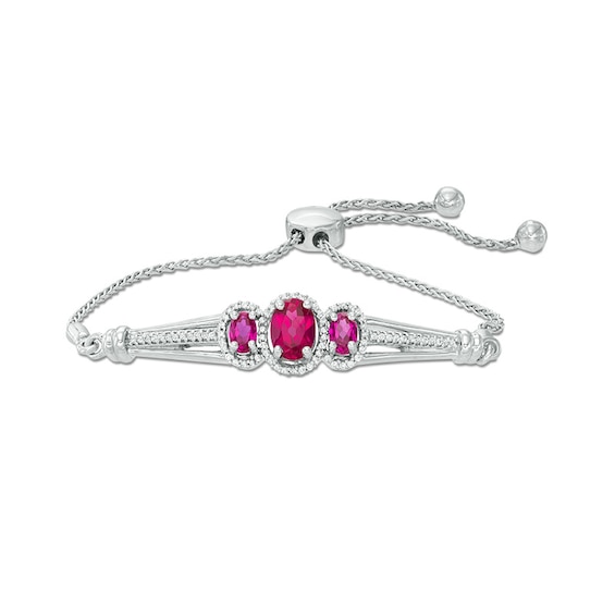 Oval Lab-Created Ruby and 0.18 CT. T.W. Diamond Three Stone Bolo Bracelet in Sterling Silver - 9.5"