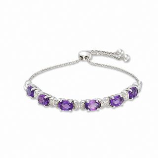 Oval Amethyst and 0.09 CT. T.W. Diamond Five Stone Bolo Bracelet in Sterling Silver - 9.5"