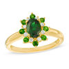 Oval Chrome Diopside and 0.12 CT. T.W. Diamond Flower Frame Ring in 10K Gold