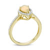 Pear-Shaped Opal and 0.15 CT. T.W. Diamond Frame Ring in 10K Gold