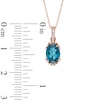 Thumbnail Image 1 of Oval London Blue Topaz and Diamond Accent Pendant in 10K Rose Gold