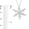 0.15 CT. T.W. Diamond Snowflake Pendant in 10K White Gold