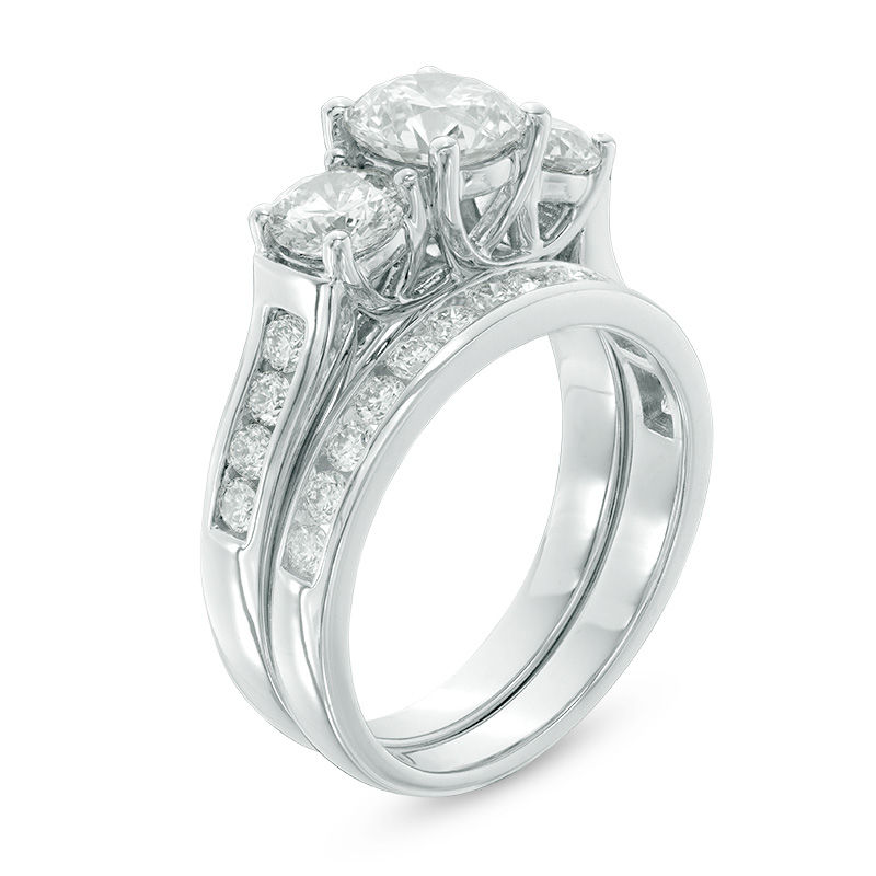 2.69 CT. T.W. Certified Canadian Diamond Past Present Future® Bridal Set in 14K White Gold (J/I2)