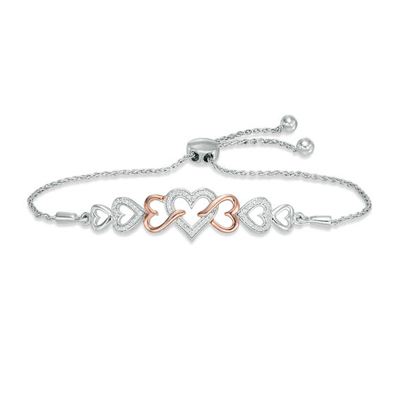 0.11 CT. T.W. Diamond Intertwining Heart Bolo Bracelet in Sterling Silver and 10K Rose Gold - 9.5"