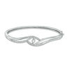 Thumbnail Image 0 of Unstoppable Love™ 0.33 CT. T.W. Diamond Swirl Bangle in Sterling Silver - 7.5"