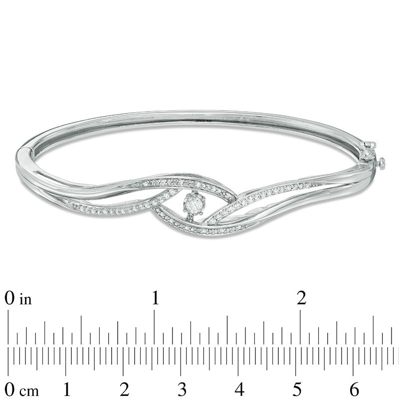 Unstoppable Love™ 0.33 CT. T.W. Diamond Swirl Bangle in Sterling Silver - 7.5"|Peoples Jewellers