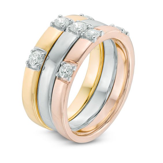 0.45 CT. T.W. Diamond Seven Stone Three Piece Stackable Ring Set in 10K Tri-Tone Gold