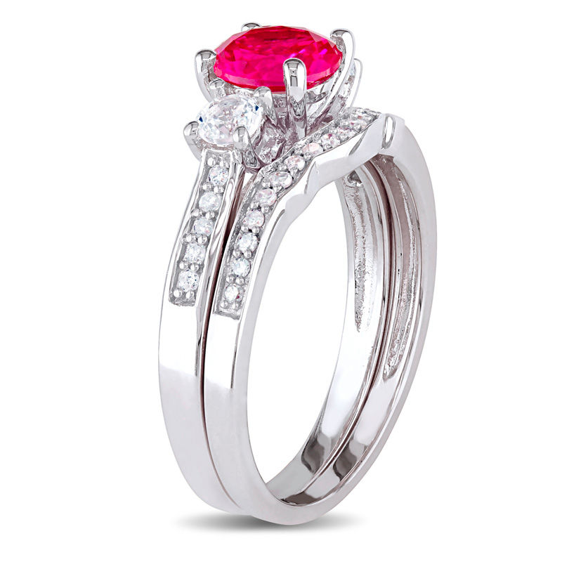 6.0mm Lab-Created Ruby and White Sapphire with 0.14 CT. T.W. Diamond Three Stone Bridal Set in 10K White Gold|Peoples Jewellers
