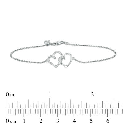 0.04 CT. T.W. Diamond Interlocking Hearts Bracelet in Sterling Silver - 6.75"