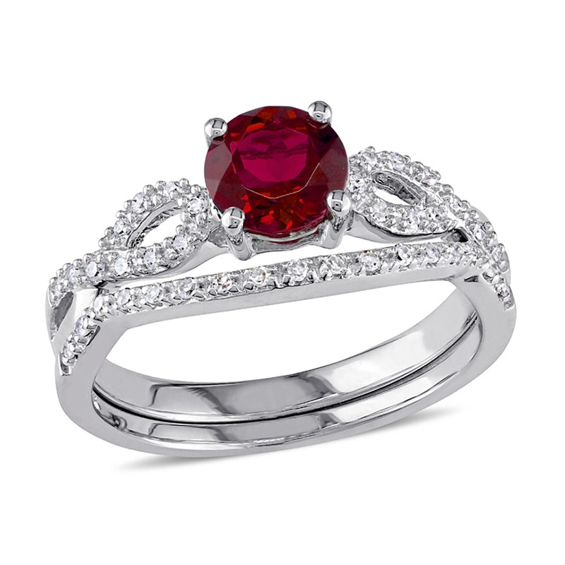 6.0mm Lab-Created Ruby and 0.14 CT. T.W. Diamond Twist Shank Bridal Set in 10K White Gold|Peoples Jewellers