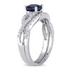 6.0mm Lab-Created Blue Sapphire and 0.14 CT. T.W. Diamond Twist Shank Bridal Set in 10K White Gold