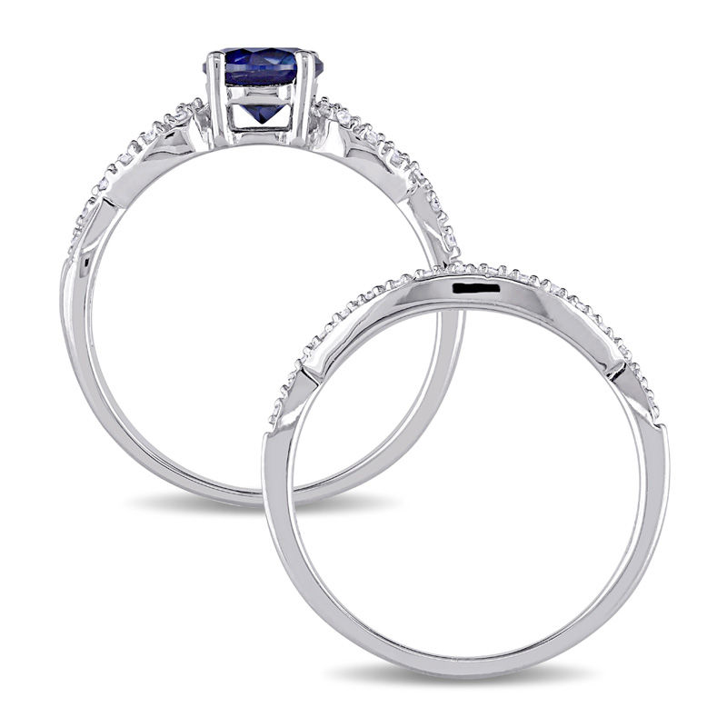 6.0mm Lab-Created Blue Sapphire and 0.14 CT. T.W. Diamond Twist Shank Bridal Set in 10K White Gold|Peoples Jewellers