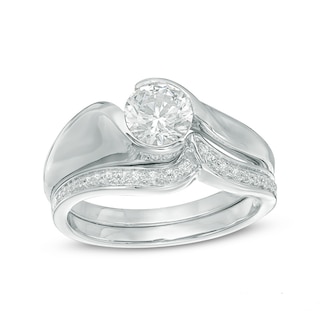 0.87 CT. T.W. Certified Canadian Diamond Swirl Bypass Bridal Set in 14K White Gold (I/I1)