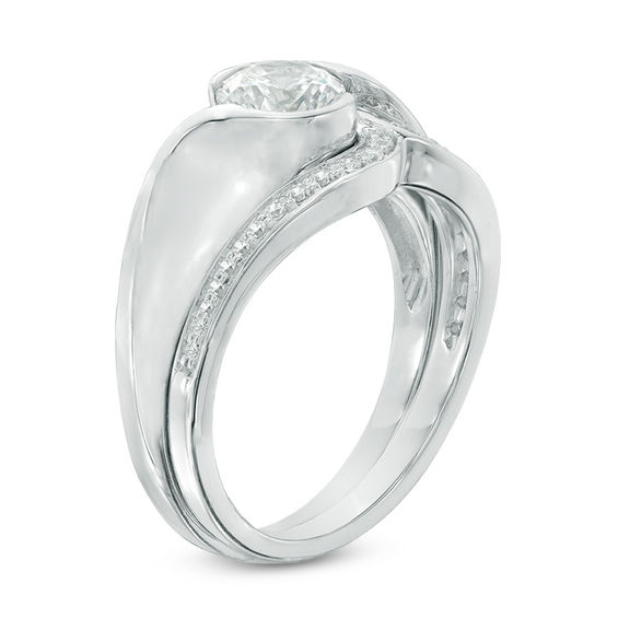 0.87 CT. T.W. Certified Canadian Diamond Swirl Bypass Bridal Set in 14K White Gold (I/I1)