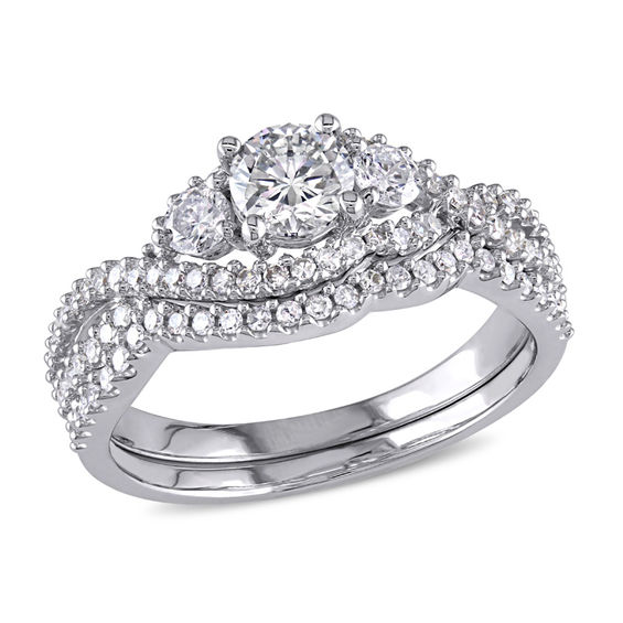 1.12 CT. T.W. Diamond Three Stone Twist Bypass Bridal Set in 14K White Gold