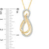 0.23 CT. T.W. Diamond Double Infinity Loop Pendant in 10K Gold