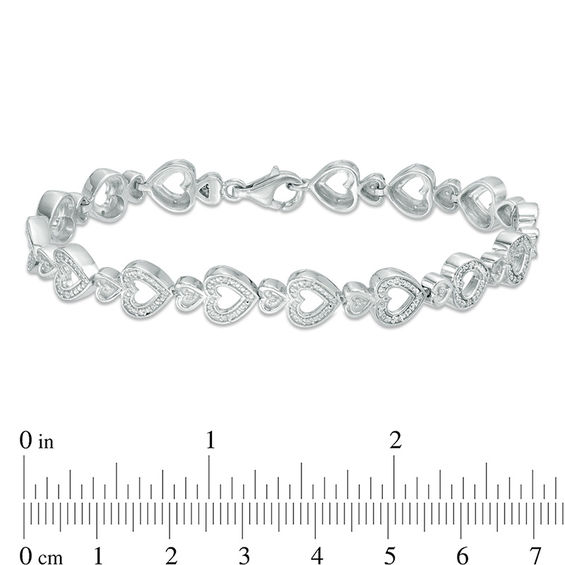 0.15 CT. T.W. Diamond Heart Bracelet in Sterling Silver - 7.5"