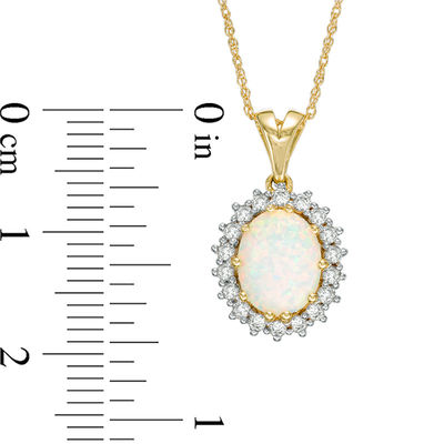 Oval Lab-Created Opal and White Sapphire Sunburst Frame Pendant in 10K Gold