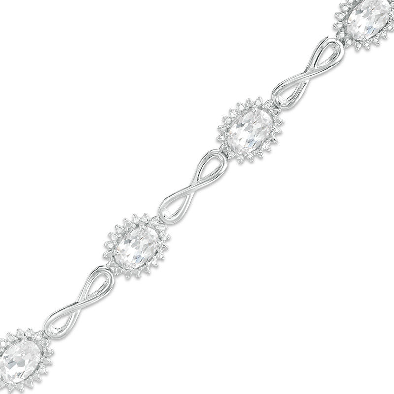 Oval Lab-Created White Sapphire Sunburst Frame and Infinity Link Bracelet in Sterling Silver - 7.5"|Peoples Jewellers