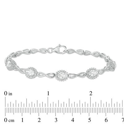 Oval Lab-Created White Sapphire Sunburst Frame and Infinity Link Bracelet in Sterling Silver - 7.5"