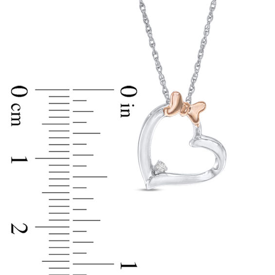 Diamond Accent Tilted Heart with Bow Pendant in Sterling Silver and 10K Rose Gold