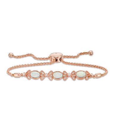 Lab-Created Opal and White Sapphire Bow Bolo Bracelet in Sterling Silver with 18K Rose Gold Plate - 9.0"