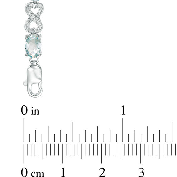 Oval Aquamarine and Diamond Accent Heart-Shaped Infinity Bracelet in Sterling Silver - 7.25"