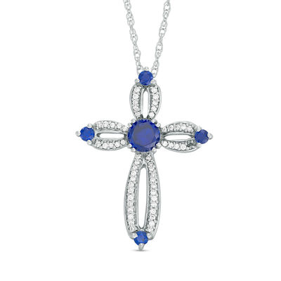 5.0mm Lab-Created Blue Sapphire and 0.18 CT. T.W. Diamond Loop Cross Pendant in Sterling Silver