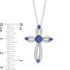 5.0mm Lab-Created Blue Sapphire and 0.18 CT. T.W. Diamond Loop Cross Pendant in Sterling Silver