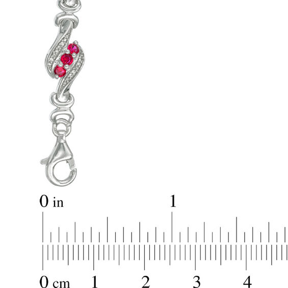 Lab-Created Ruby and 0.23 CT. T.W. Diamond Swirl Three Stone Bracelet in Sterling Silver - 7.5"