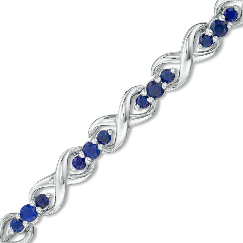 Lab-Created Blue Sapphire Three Stone Infinity Bracelet in Sterling Silver - 7.5"|Peoples Jewellers