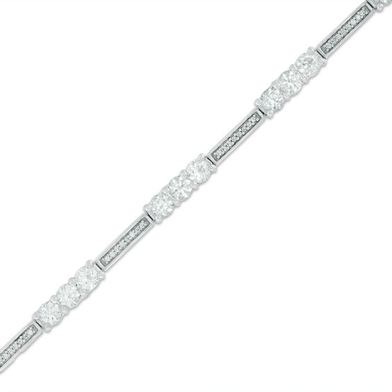 3.5mm Lab-Created White Sapphire and 0.18 CT. T.W. Diamond Three Stone Station Bracelet in Sterling Silver - 7.5"