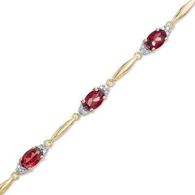 Oval Garnet and Diamond Accent Bracelet in Sterling Silver with 10K Gold Plate - 7.25"