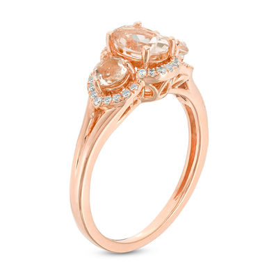 Oval Morganite and 0.12 CT. T.W. Diamond Frame Three Stone Ring in 10K Rose Gold