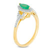 Marquise Emerald and 0.14 CT. T.W. Diamond Frame Buckle Ring in 10K Gold