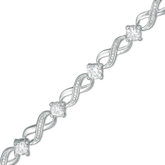 Lab-Created White Sapphire and 0.15 CT. T.W. Diamond Infinity Bracelet in Sterling Silver - 7.25"