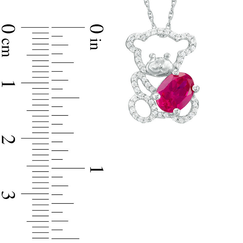 Oval Lab-Created Ruby and 0.18 CT. T.W. Diamond Teddy Bear Pendant in Sterling Silver