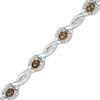 Oval Smoky Quartz and 0.15 CT. T.W. Diamond Frame Twist Station Bracelet in Sterling Silver - 7.5"